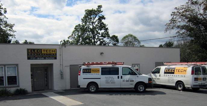 ElecTech Contracting office and service vehicles